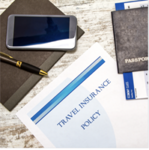 a travel insurance packet, a passport, and a phone